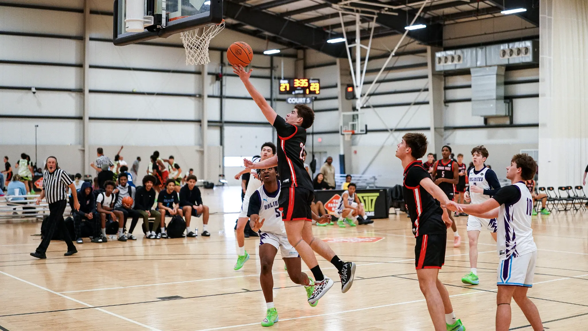 Carlos Lopez drives to the basket